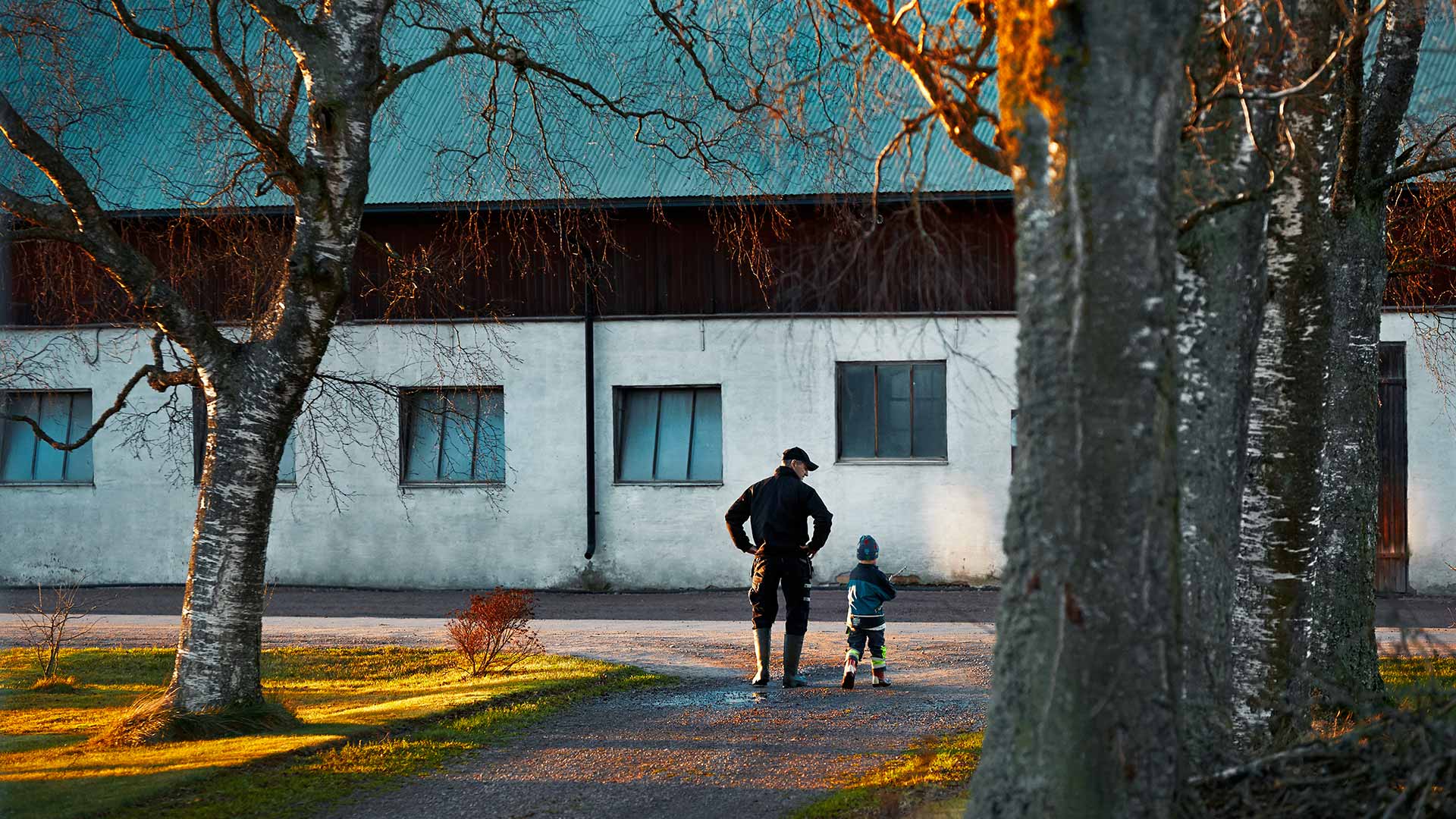 Man and kid walking